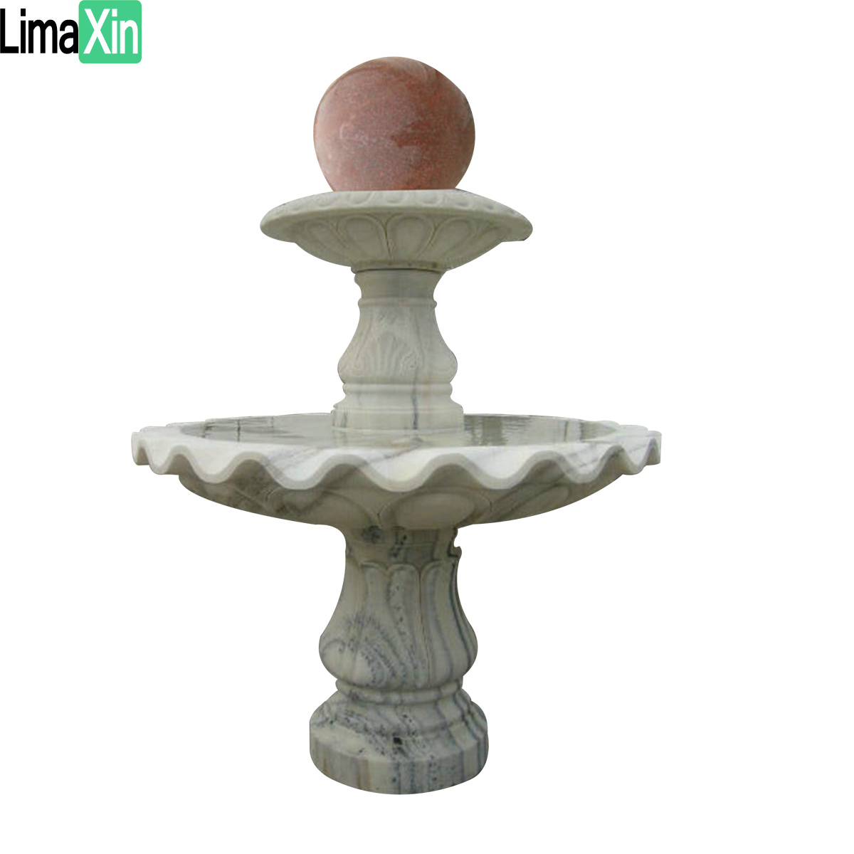Ball sitting on a black granite fountain — image 3